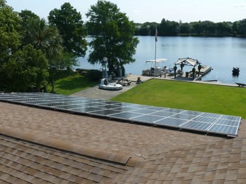 Solar panels on shingle roof near Hillsborough river