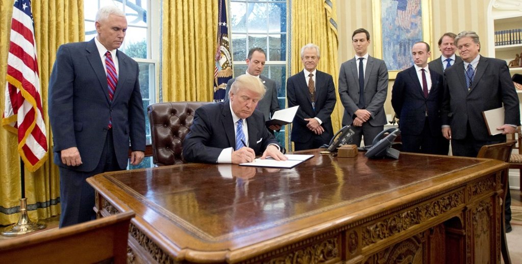 President Trump signing documents