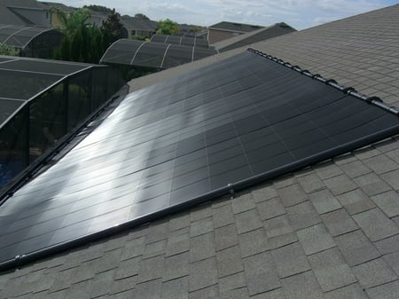 solar-pool-panels-vs-gas-in-ground-pool-heaters.png